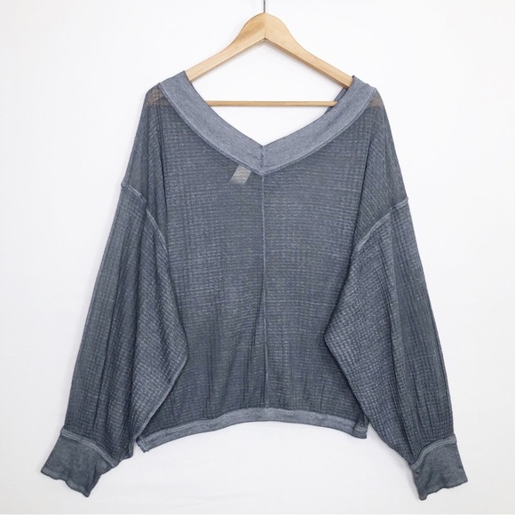 Free people with a free, gray, sheer oversized top - Picture 4 of 12